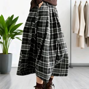 TEMU 2025년 가을/겨울용 블랙 앤 화이트 체크 플레어 스커트는 허리선을 부드럽게 감싸는 루즈핏으로 디자인되었으며, 미디 길이의 A라인 디자인을 특징으로 합니다. 일상적인 출퇴근, 주말 쇼핑, 캐주얼한 외출에 완벽합니다.