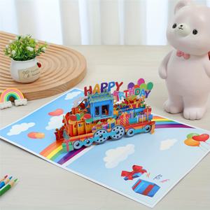TEMU 풍성한 색상 팝업 기차 생일 카드 (풍선 및 선물 포함), 재미있는 3D 생일 축하에 완벽. 장난기 넘치는 디자인과 만화 삽화가 특징인 휴일 인사말로 이상적입니다.