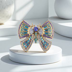 TEMU 금색 톤에 파란색과 보라색 라인스톤이 장식된 우아한 리본 브로치 1개. 발렌타인데이, 이브닝 드레스, 고급스러운 가라, 로맨틱한 모임에 이상적입니다. 친구를 위한 매력적이고 로맨틱한 선물입니다.