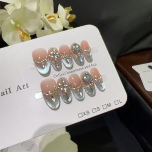 TEMU 전체 드릴링 고양이 눈 디자인의 품질의 10개 인조 손톱 세트. 여성용 짧은 네일 패치 디자인으로, 은은한 고급스러운 미학을 구현합니다.