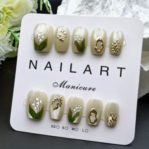 TEMU 여성을 위한 핸드메이드 가을/겨울용 그린 숏 스퀘어 누ob 인조네일 10개 세트, 금박 효과와 캣아이 마감이 있는 고급스러운 꽃무늬 패턴 디자인. 젤리 접착제 1장, 네일 스틱 1개, 폴리싱 스트립 1개 포함. 파티, 여행, 댄스, 데일리웨어에 적합. 친구에게 선물하기 좋고 재사용 가능