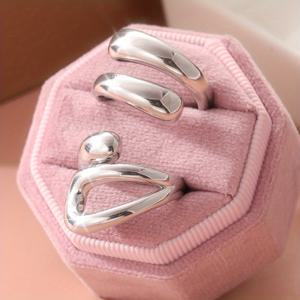 TEMU 이 반지는 아방가르드와 모던한 디자인 감각을 선보입니다. 심플하면서도 조각적인 예술적 매력을 지닌 홀아웃 디자인이 일상과 모임에 어울리며, 선물로도 완벽한 선택