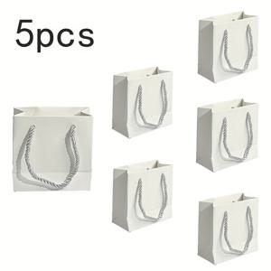 TEMU 주얼리 포장에 이상적인 작은 선물 가방 5개 세트. 발렌타인데이, 생일, 크리스마스와 같은 특별한 날을 위한 선물 상자 꾸미기에 완벽합니다. 이 다용도 가방은 간편하면서도 우아한 디자인을 특징으로 합니다.