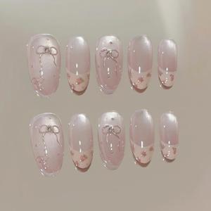 TEMU 10개입 새로운 프린트 리본 하이엔드 스킨 순수 수제 착용 가능한 크림색 플로럴 스위트 & 쿨 수작업 핸드페인팅 부드러운 핑크 리본 프렌치 스타일 엣지 모양 수제 인조 손톱, 부드럽고 귀여운 탈부착식 데일리 인조 손톱