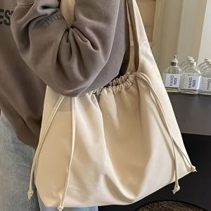 TEMU 2025년 신상 드로스트링 가방, 넉넉한 디자인으로 출퇴근에 적합하며 사무실에서 사용하기 좋습니다. 크로스바디 또는 원숄더 스트랩으로 착용 가능합니다.