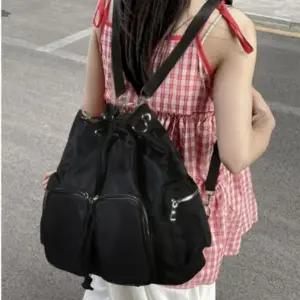 투포켓 버킷 숄더 겸 백팩 투웨이 가방