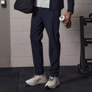 [롯데백화점]르꼬끄 공용 슬림핏 트리코트 본딩 트랙팬츠 QQ323EFP91_BLK