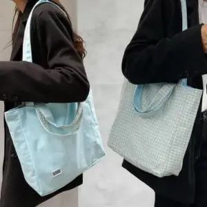 [옷자락]여성 일상 리버시블 체크 솔리드 보부상 숄더백