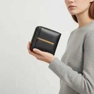 FW25 여성 가죽 반지갑 XAWDBMAI200UPP B999