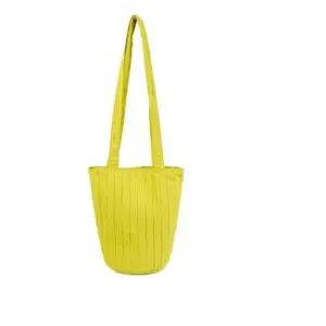 롱 숄더백 여성 원통 패딩 퀼팅 데일리 가방 옐로우