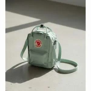 MUST IT_피얄라벤 칸켄 슬링 미니 크로스백 민트 그린 23797-600