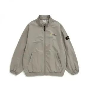 내셔널지오그래픽 키즈 K233UFT930 우븐 트레이닝 자켓 GRAY BEIGE 363771