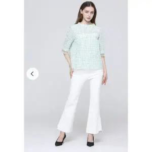 [손정완](신세계 사우스시티)모던 펀칭 체크 블라우스ZBL5151111