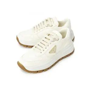 프라다 프랙스 01 가죽 스니커즈 1E804M 038 F0304