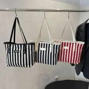 스파이더맨 여사친 빈티지 캐주얼 숄더백 대용량 스트라이프 OPH5