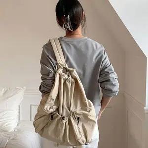 [하프클럽/]여자 데일리 경량 나일론 복조리 포켓 백팩