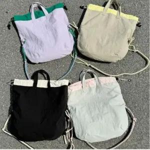 [패션] 여성 매듭 끈 복조리백 스타일 배색 숄더백 크로스백