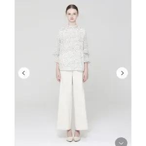 [손정완](신세계 사우스시티)도트 프릴 블라우스ZDR5151231