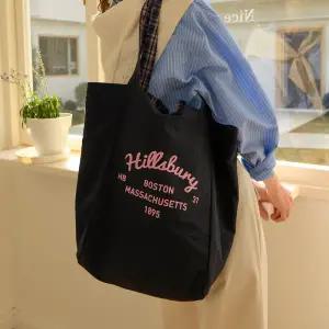 [롯데백화점]피그먼트 양면 체크 바스락 백 KBE260106