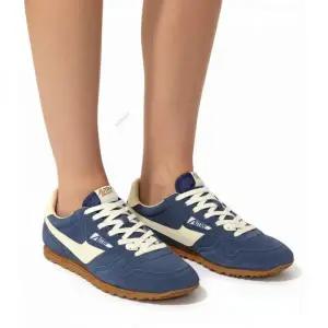 오트리 26SS 윈드스핀 스웨이드 스니커즈 (WSLM UB28)