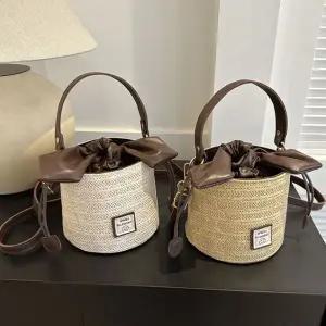 [골드스마일]원통 리본 여자 크로스백 토트백 라탄백 데일리 가방