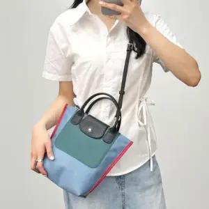 토트 데일리 크로스백