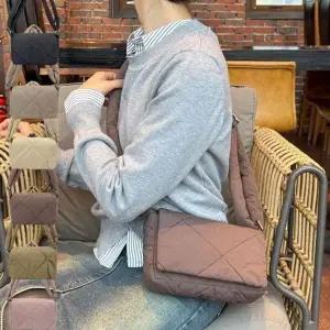 WL 따뜻하고 포근한 패딩 소재 디자인 소지품을 체계적으로 보관