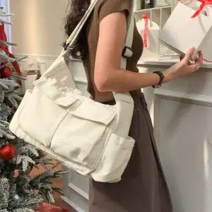 WL 데일리 캔버스 여성 숄더 크로스백 여행용 가방 ivory