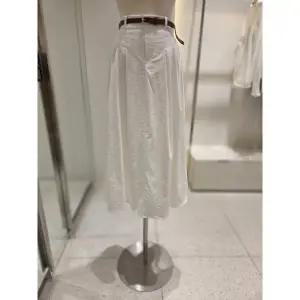 [SOUP](신세계 사우스시티) 벨트 세트 롱 플레어 스커트 (SC3SR80)