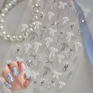 네일아트 진주로 포인트를 준 레이스 리본 엠보스티커