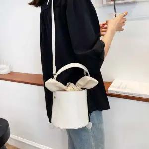 원통매듭 미니크로스백 WFJ677S