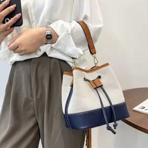 여자배색스티치버킷백 여성버킷백 모던여자크로스백 여자크로스백 여성크로스백