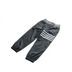 [톰브라운] 샤이니 립스탑 4-바 트랙 팬츠 154696326