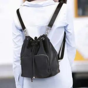20대 여성 숄더백 대학생 데일리 작은백팩 복조리가방