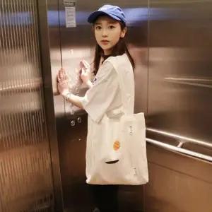 캔버스 숄더백 학생가방 보조가방 자수 심플 에코백