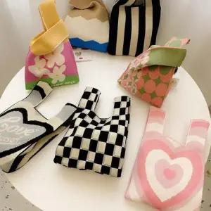 스트랩 니트 토트백 파우치 손목가방