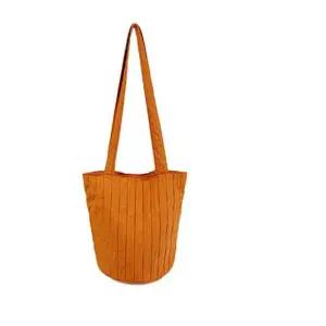 롱 숄더백 여성 원통 패딩 퀼팅 데일리 가방 다크오렌지