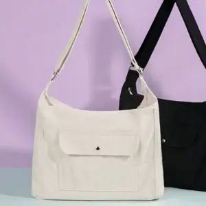 에코 숄더백 심플한 포켓 크로스 가방 아이보리