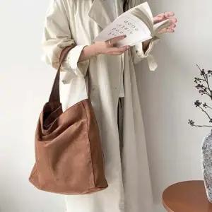 스웨이드소재 따뜻한분위기연출 데일리 아이템 여성백