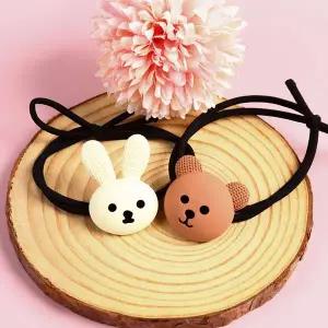 미소짓는 곰과 토끼 머리끈 헤어끈