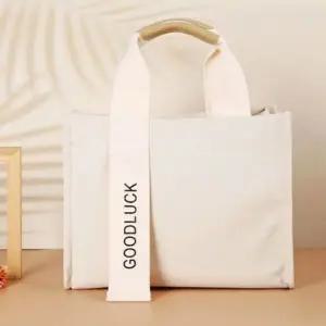 토드백 에코 캔버스 미니 크로스 가방 아이보리