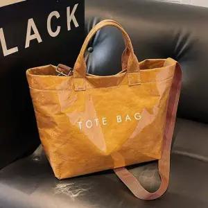 여성 캐주얼 가방 예쁜 종이 PVC 크로스 백 탄 여성크로스백