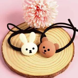 미소짓는 곰과 토끼 머리끈 헤어끈