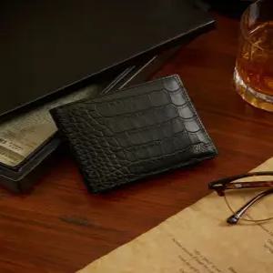 닥스 액세서리 남성 25SS [스테디셀러] 블랙 로고장식 소가죽 반지갑 WBWA5E509BK