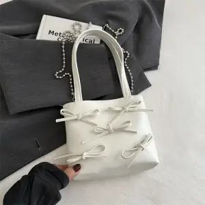 천진반 여자 미니 여름 발레풍 데일리룩 체인 크로스 미니백 가방 스위트 토트백 리본 KUK2