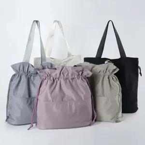 조임끈 버킷백 스타일 캐주얼 데일리 에코 숄더백