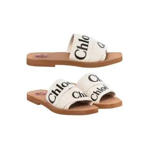 [명품] 26SS 우디 로고 스트랩 샌들 아이보리 CHC22U188Z3 101
