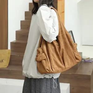 여자 스웨이드 숄더백 대학생 출근 가방 브라운카멜