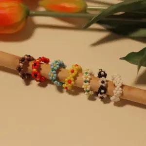 [옷자락]여자 데일리 컬러 비즈 꽃 삐삐 레이어드 반지