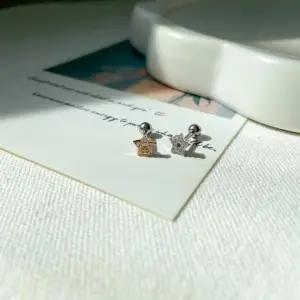 [옷자락]여자 트렌디 레이어드 별 큐빅 써지컬 피어싱